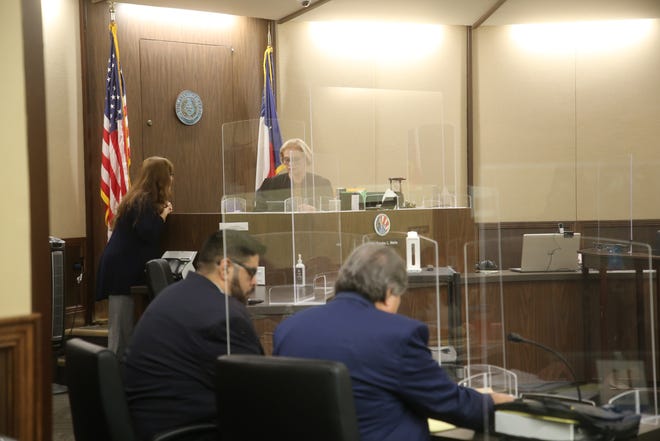 Former Calallen ISD teacher Joseph M. Sandoval and his defense attorney, Abel Cavada, appear before Judge Sandra Watts in the 117th District Court for Sandoval's jury trial on Thursday, March 3, 2022.