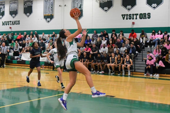Mainland sophomore Bella Marur scores two of her game-high 17 points ahead of the pack against Timber Creek