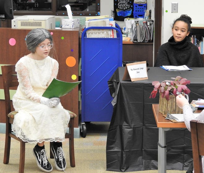 Serenity Arens as the white witch and Alivia Jones as the judge participated in a mock trial project at Coshocton Elementary School based on the book "The Jumbies."