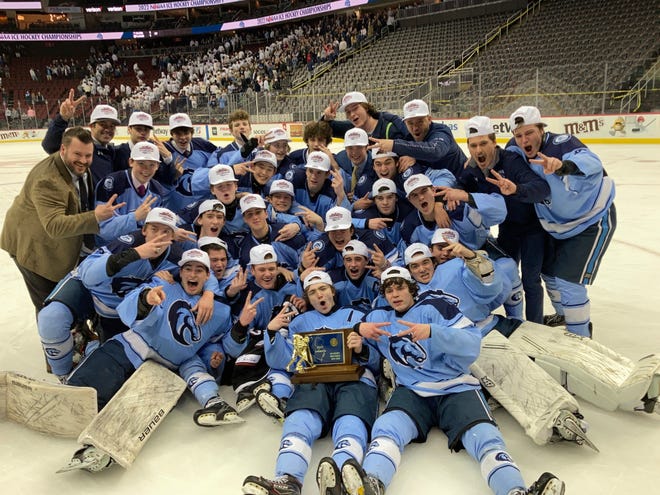 Christian Brothers Academy's hockey team celebrates after defeating Delbarton, 3-0, in the NJSIAA Non-Public final on March 7, 2022 at the Prudential Center in Newark.