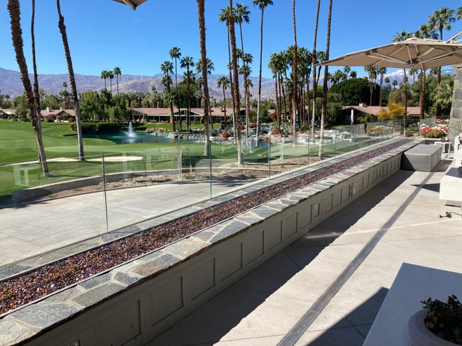 A new 10,000-square-foot outdoor dining area overlooking the golf course is part of the renovation of the clubhouse at The Lakes Country Club in Palm Desert.