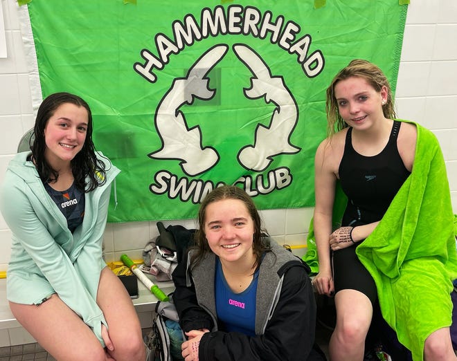 Hammerhead Swim Club seniors (from left) Tori Beigle, Laura Pawlick and Megan Novak competed in their final event with the club in Grand Rapids recently at the USA-Michigan Swimming Regional Championship meet.