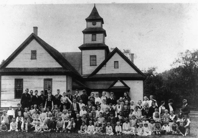 Students pose in front of the Swannanoa School in the 1920s.