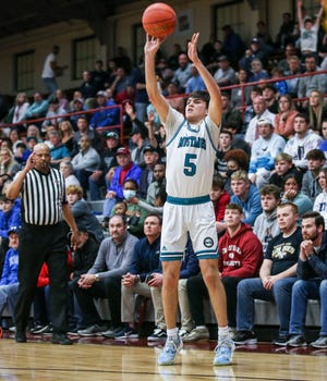 North Oldham's Jack Scales hits a three-point shot in the Mustangs' win over Woodford County in the 2022 Eighth Region Final in New Castle, Ky.