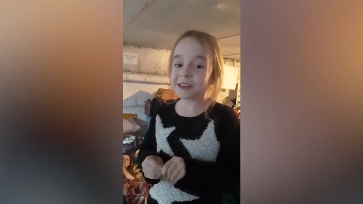 Footage shows the the heartwarming moment a young Ukrainian girl sang 'Let It Go' from Disney's 'Frozen' to local residents inside an air raid shelter in Kyiv.