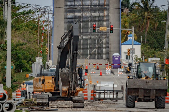 The drawbridge on George Bush Boulevard is in the vertical position and signs signify the bridge is out of service Thursday in Delray Beach.