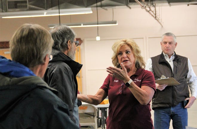 Otero County Clerk Robyn Holms, middle, speaks with a member of New Mexico Audit Force prior to the ballot rerun at the Otero County Fairgrounds on March 9, 2022 while Otero County Undersheriff Sean Jett looks on.
One of the facets of the Otero County 2020 Election Audit is an inspection and rerun of all the ballots that were cast during the 2020 General Election.