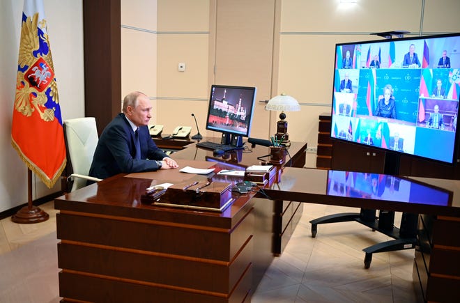 Russian President Vladimir Putin chairs a Security Council meeting via videoconference at the Novo-Ogaryovo residence outside Moscow, Russia, Thursday, March 3, 2022. (Andrei Gorshkov, Sputnik, Kremlin Pool Photo via AP)