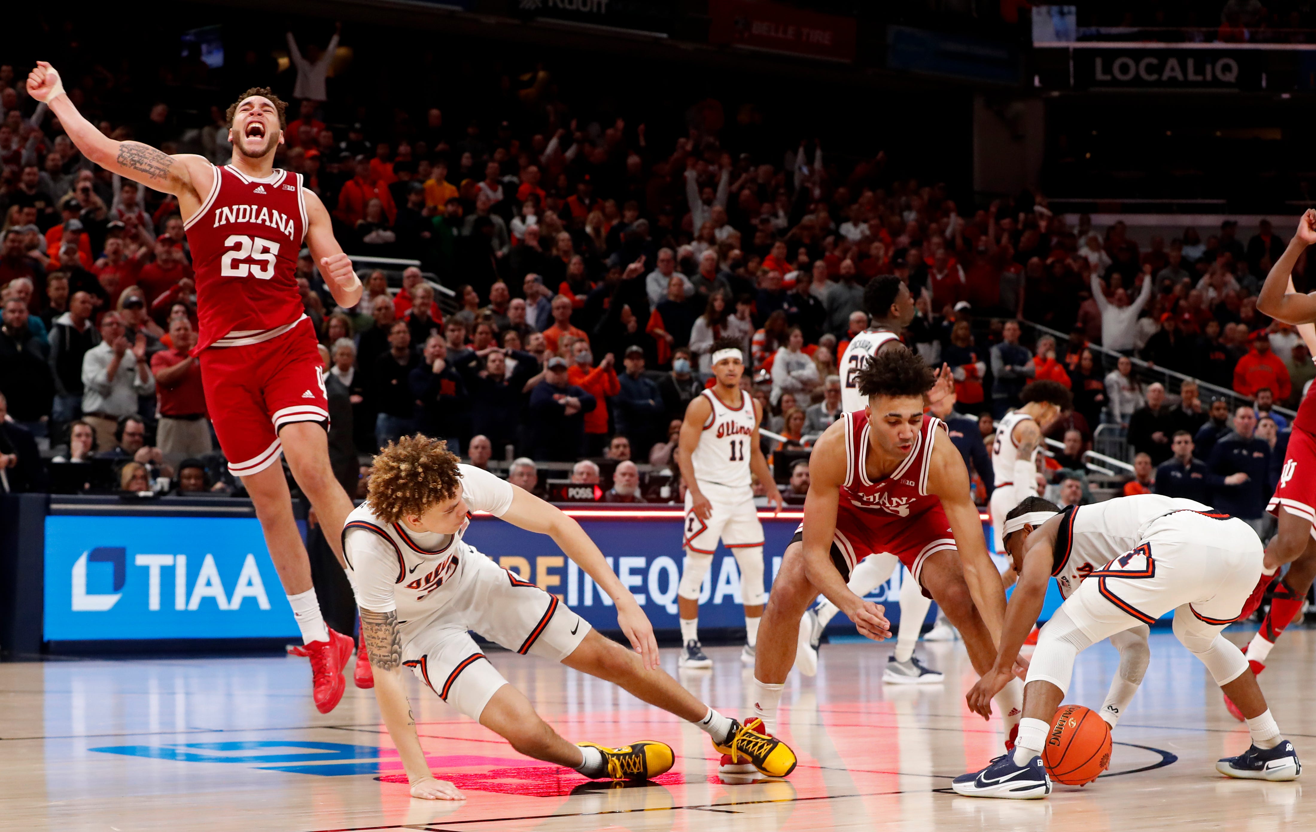 Indiana Hoosiers forward Race Thompson (25) celebrates as the clock runs out during the men’s Big Ten tournament game against the Illinois Fighting Illini, Friday, March 11, 2022, at Gainbridge Fieldhouse in Indianapolis. The Hoosiers won 65-63. 
