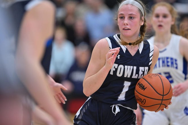 Fowler junior guard Emma Riley looks for an opening against Saginaw Nouvel during the Eagles' 52-42 Division 4 regional final victory on Thursday.