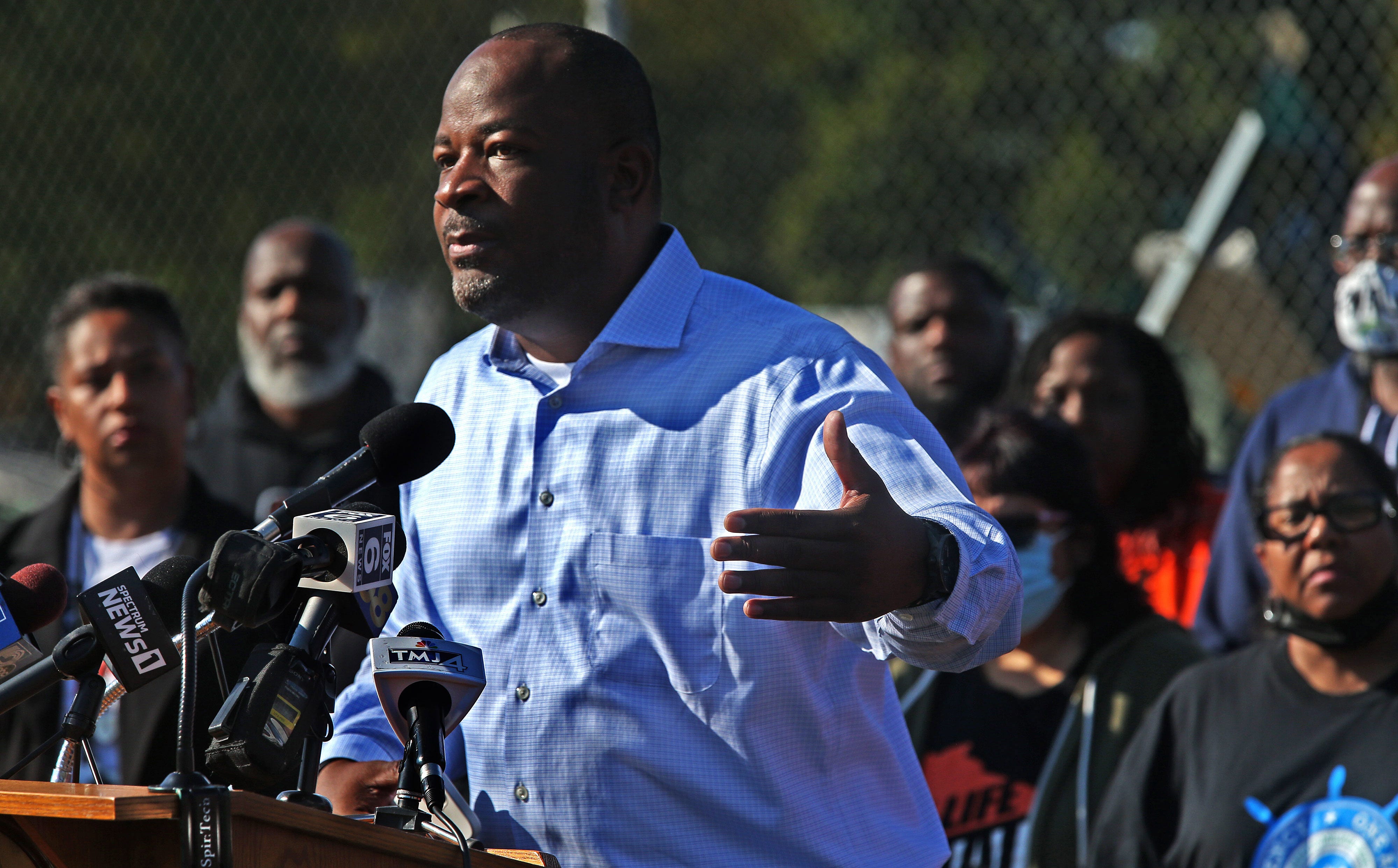 Reggie Moore, director of violence prevention policy and engagement at the Medical College of Wisconsin, speaks at a news conference in Sherman Park on Oct. 6, 2021. Moore and his wife, Sharlen, started the Urban Underground in 2000.