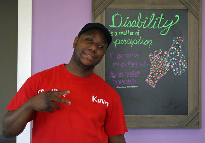 Kevin Bizzell poses for a photo at Special Blendz Cafe on East Dixon Boulevard in Shelby Saturday morning, March 12, 2022.