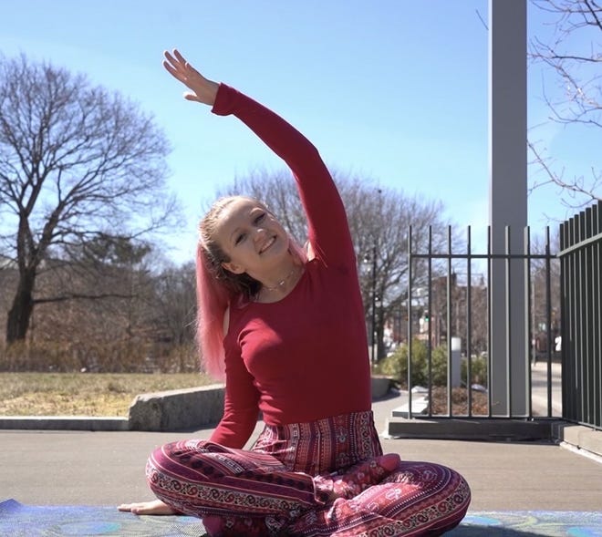 Beyond her ganja yoga,  Melanie Adams teaches four to five vinyasa yoga classes a week at Clark, Holy Cross, and sometimes Anna Maria College.
