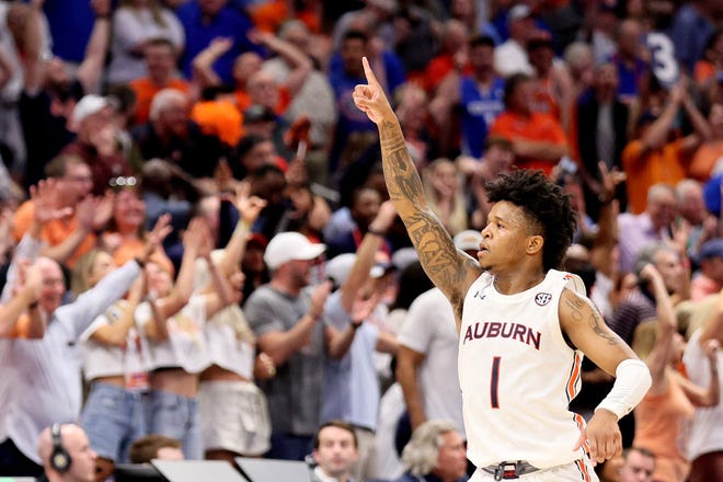 TAMPA, FLORIDA - MARCH 11: Wendell Green Jr. #1 of the Auburn Tigers celebrates a basket against the Texas A&M Aggies during the second half in the Quarterfinal game of the SEC Men's Basketball Tournament at Amalie Arena on March 11, 2022 in Tampa, Florida. (Photo by Andy Lyons/Getty Images)