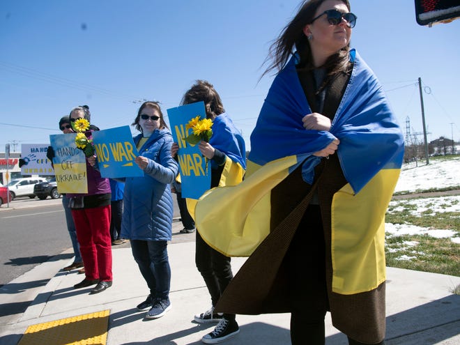Olha Popova demonstrates against the Russian invasion of Ukraine at the intersection of Kingston Pike and Morrell Rd. on Sunday, March 13, 2022. The weekly demonstration are organized by the Oak Ridge Environmental Peace Alliance. 