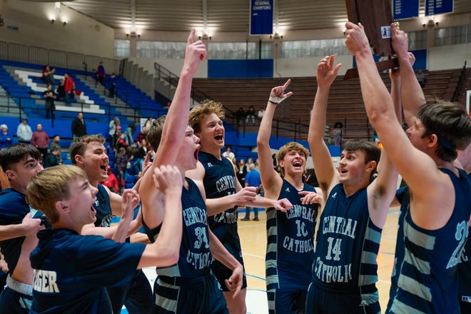 Central Catholic celebrates a Regional Championship victory on Saturday, March 12, 2022, at Frankfort High School in Frankfort.