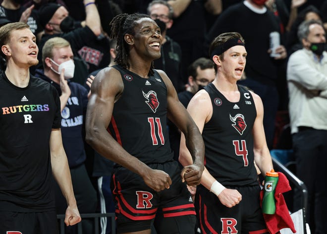 Feb 16, 2022; Piscataway, New Jersey, USA;Rutgers Scarlet Knights center Clifford Omoruyi (11) and guard Paul Mulcahy (4) reacts during the second half against the Illinois Fighting Illini at Jersey Mike's Arena. Mandatory Credit: Vincent Carchietta-USA TODAY Sports