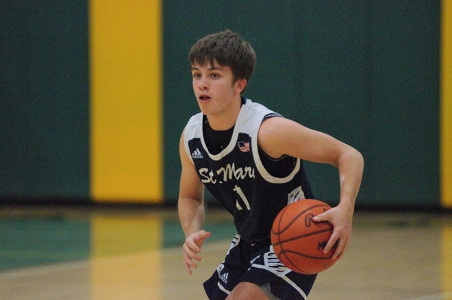 Junior Gavin Bebble leads St. Mary with 20 points in the district championship loss to Ellsworth.