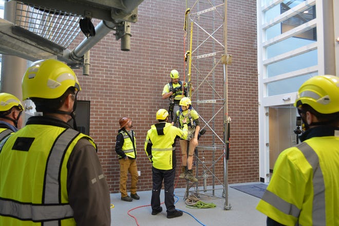 One of the ways Jim Tracy has assisted in providing safety to tower workers is by building indoor practice towers. Employees practice safety techniques and develop muscle memory if something were to go wrong 100 feet in the air.