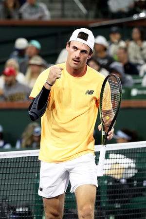 Tommy Paul of the United States reacts during his second round win against Alexander Zverev of Germany during the BNP Paribas Open in Indian Wells, Calif., on March 13, 2022.