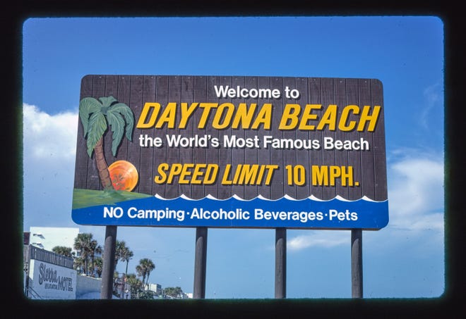 The Daytona Beach city limits sign on the beach 1985.