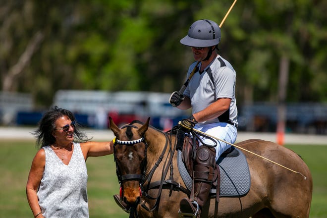 Janet O'Hara meets polo player Brendan Tetrault and his horse.  Dallas.