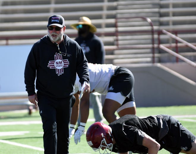 First year coach Jerry Kill barks out orders on the first day of Spring Practice for the NMSU Aggies.
