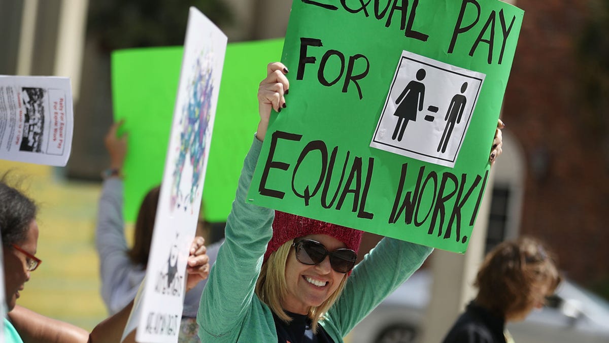 Elana Goodman joins a rally for equal pay on March 14, 2017 in Fort Lauderdale, Florida.