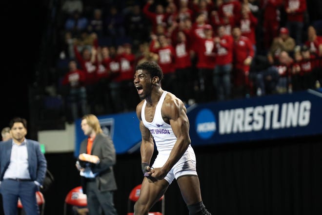 Mount Union's Jordin James reacts to winning his national title at the NCAA Division III Wrestling Championships in Cedar Rapids, Iowa