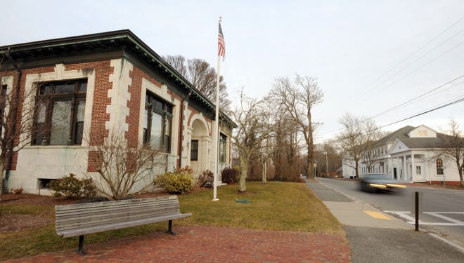 Harwich Town Hall, left, in this 2019 file photo. Merrily Cassidy/Cape Cod Times