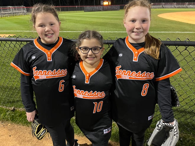 Tennessee Crush players Hadleigh Spoon, Ava Prince and Hinleigh Spoon, all 9, attend the Midstate Classic in Columbia on March 15, 2022.