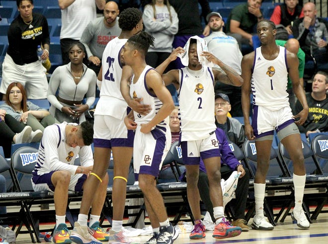 Dodge City players get up at the end of their game against Northwest Florida State Thursday afternoon at the NJCAA Division I Men's Basketball Tournament in the Sports Arena. NW Florida defeated Dodge City 92-74. 