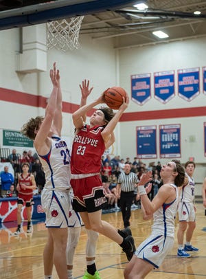 Bellevue's Caleb Betz goes for the hoop during first half action of this regional finals  on Wednesday, March 16, 2022.