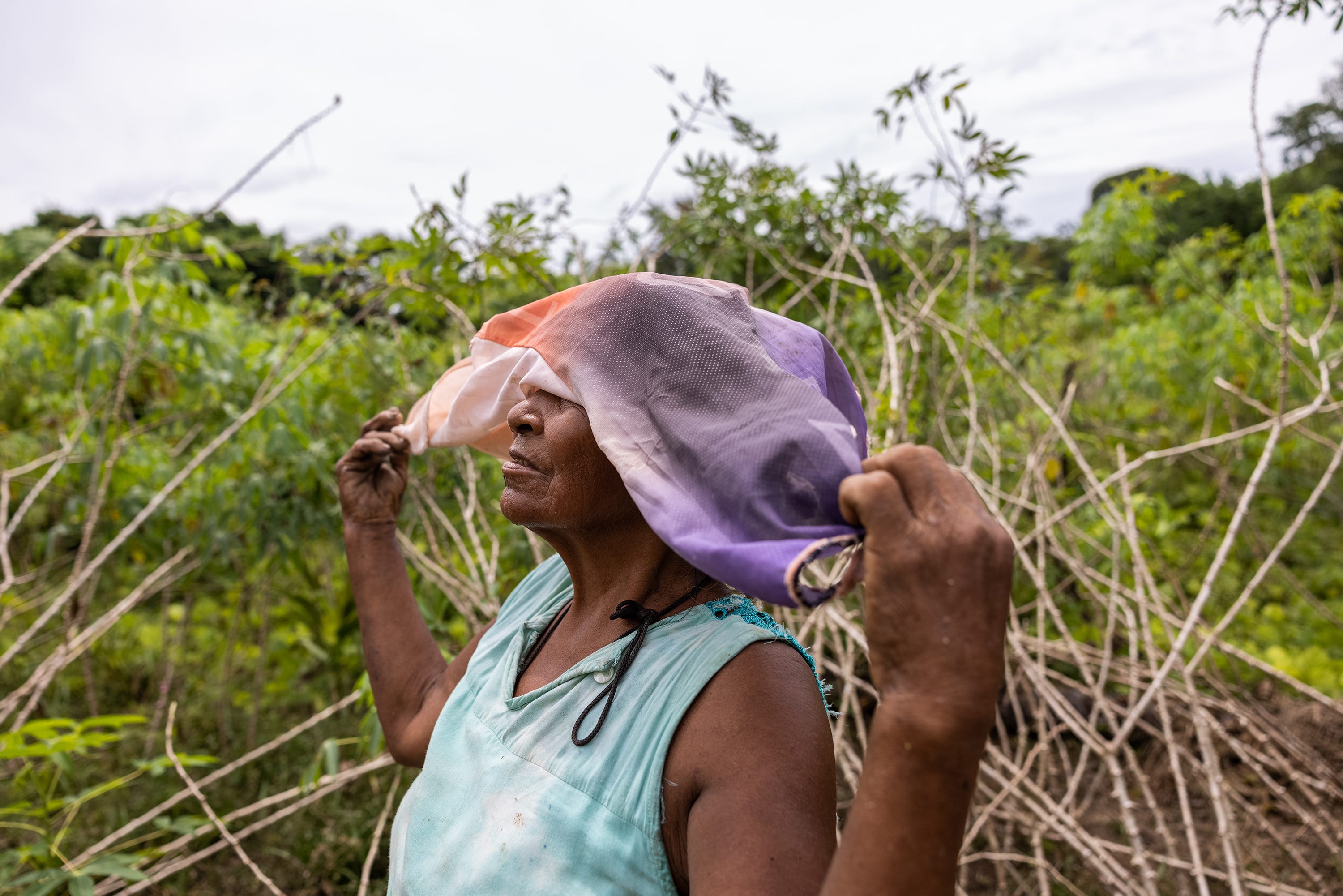Matilde Fernando Parente prepares for a harvest day of Yuca brava under the sun. The mañoco, a product that they get from this yucca, is a staple of her Amazon community's diet.
