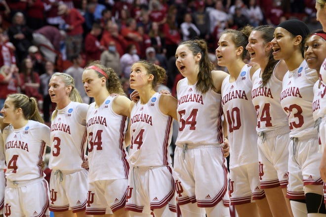 Indiana sings the alma mater after their victory of the Indiana versus Charlotte women's NCAA First Round game at Simon Skjodt Assembly Hall on Saturday, March 19, 2022.