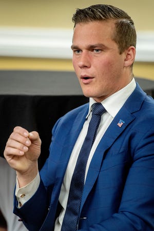 Rep. Madison Cawthorn addresses the Henderson County Republican Men’s Club March 19, 2022 in Hendersonville.