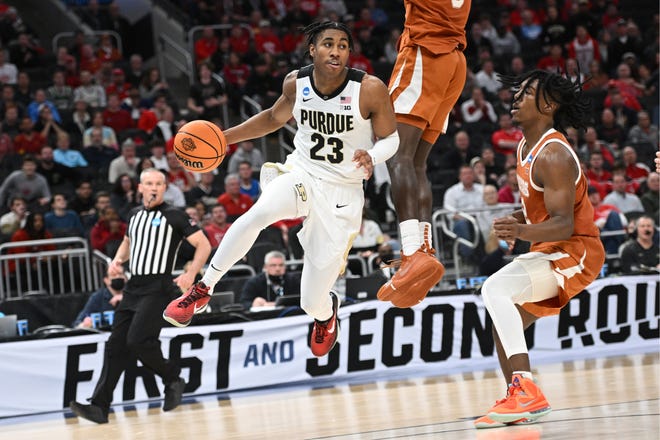 Purdue guard Jaden Ivey drives to the basket during the second half of the Boilermakers' 81-71 win over Texas in the second round of the NCAA Tournament. Ivey was scoreless in the first half but finished with 18 points.