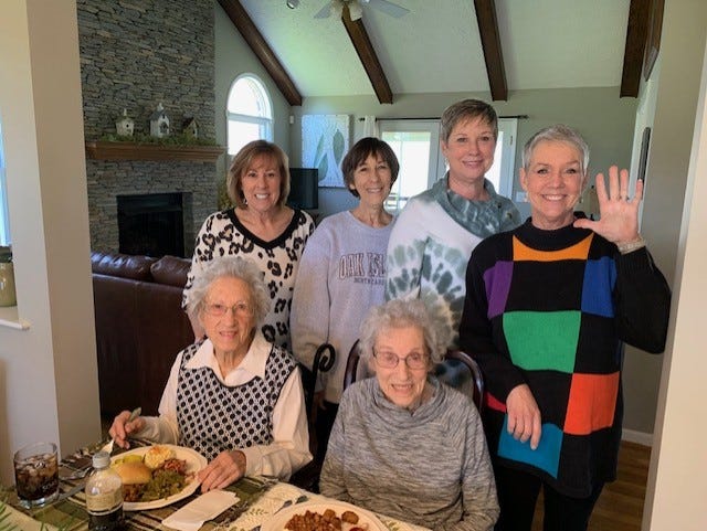 Top row from left: Ann Rogers, Dena Carpenter, Susan Justice and Libby Bagwell. Bottom row from left: Adene Hicks and Christine Benjamin. The family is photographed as they celebrate the surprise birthday party for the twins March 12.