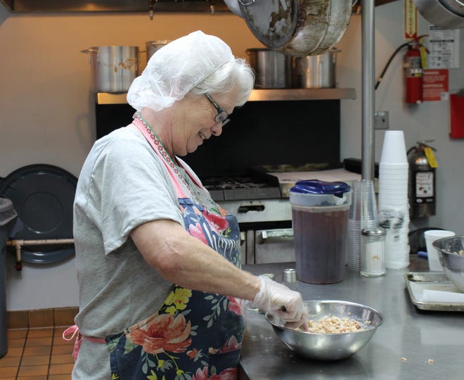 Judy Garland, the chef at the NEW Center in Fort Smith, prepares lunch on March 17, 2022.