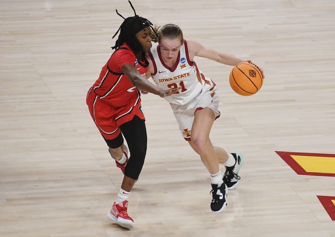 Iowa State Cyclones guard Lexi Donarski (21) drives around Georgia Bulldogs guard Que Morrison (23) during the third quarter in the NCAA women's basketball second-round at Hilton Coliseum Sunday, March 20, 2022, in Ames, Iowa.
