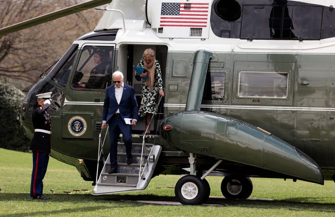President Joe Biden and First Lady Jill Biden return to the White House on March 20, 2022 in Washington, DC.