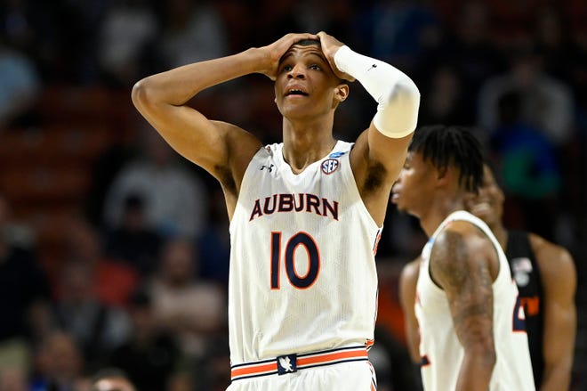 Jabari Smith of the Auburn Tigers reacts in the second half against the Miami (Fla.) Hurricanes during the second round of the 2022 NCAA Men's Basketball Tournament at Bon Secours Wellness Arena on March 20, 2022 in Greenville, South Carolina.