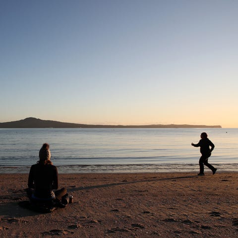 10. New Zealand   People enjoy the sunrise on Kohim