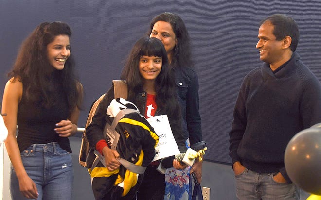 Aanya Shetty, 11, a sixth grader at John Warner Middle School, celebrates with her family after winning the 2022 Columbia Missourian Regional Spelling Bee at the Reynolds Journalism Institute at 401 S. Ninth St. Shetty won the competition and will advance to the Scripps National Spelling Bee competition in Washington, D.C., on June 2. Also shown from left, Jiya Shetty, Aanya’s sister and two-time winner of the Columbia Missourian Regional Bee from Rock Bridge High School; Aanya; and Aanya’s parents, Chaitra and Pavan Shetty.