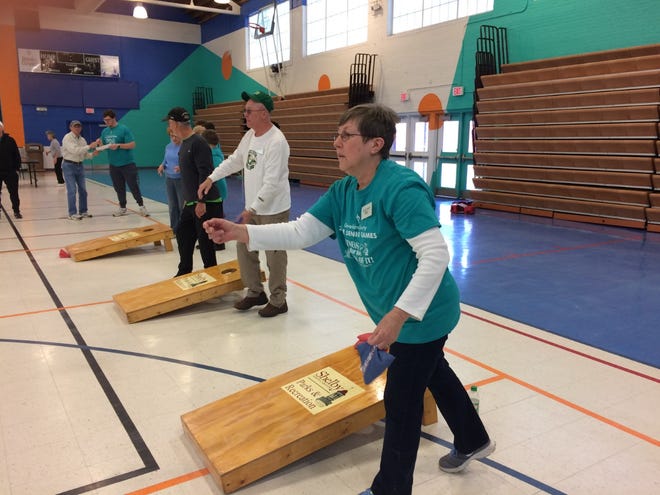 Participants test their luck in a game of cornhole at a previous Cleveland County Senior Games event.