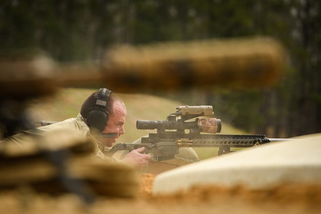 A Marine scout sniper team competes in the USASOC International Sniper Competition at Fort Bragg on Tuesday, March 22, 2022.
