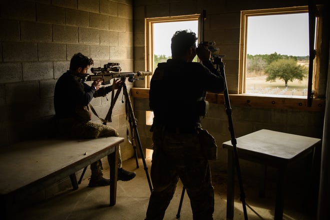 A 7th Special Forces Group sniper team competes in the USASOC International Sniper Competition at Fort Bragg on Tuesday, March 22, 2022.