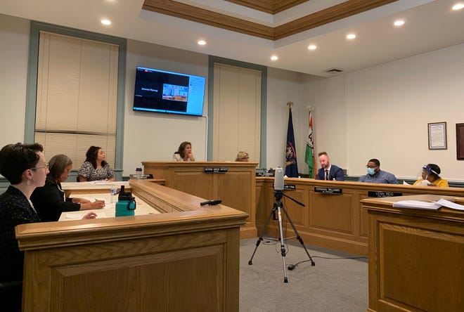 Albion City Council members consider a resolution to censure former council member Shane Williamson during a regular meeting Monday, March 21, inside city hall.