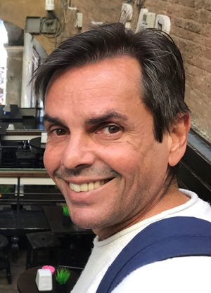 Jorge Diaz Johnston during a trip to Italy. He and his husband, Don Price Johnston, were among several gay couples who challenged Florida's ban on same-sex marriage and won major court victories in 2014. Jorge was found dead Jan. 8, the victim of a homicide.