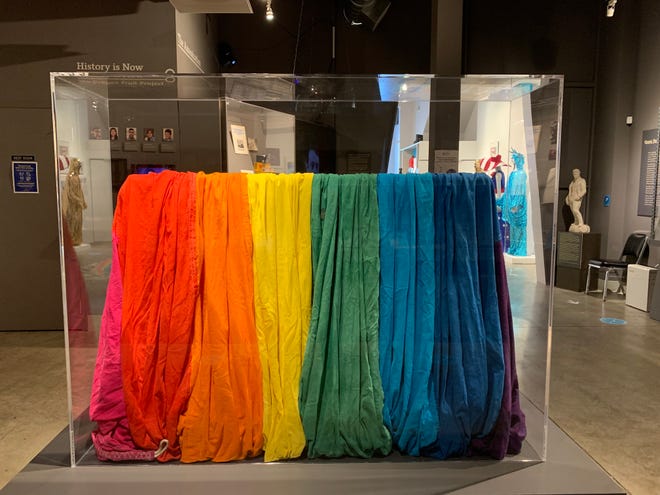 The segment of one of the original rainbow flags created for San Francisco Gay Freedom Day 1978 rests in its case at the GLBT Historical Society Museum.